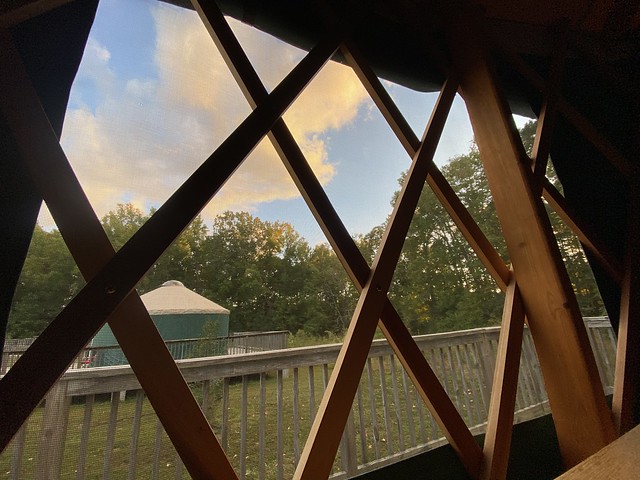 Looking out the window above the bed inside yurt 1 at Machicomoco State Park. Photo by Haley Rodgers.
